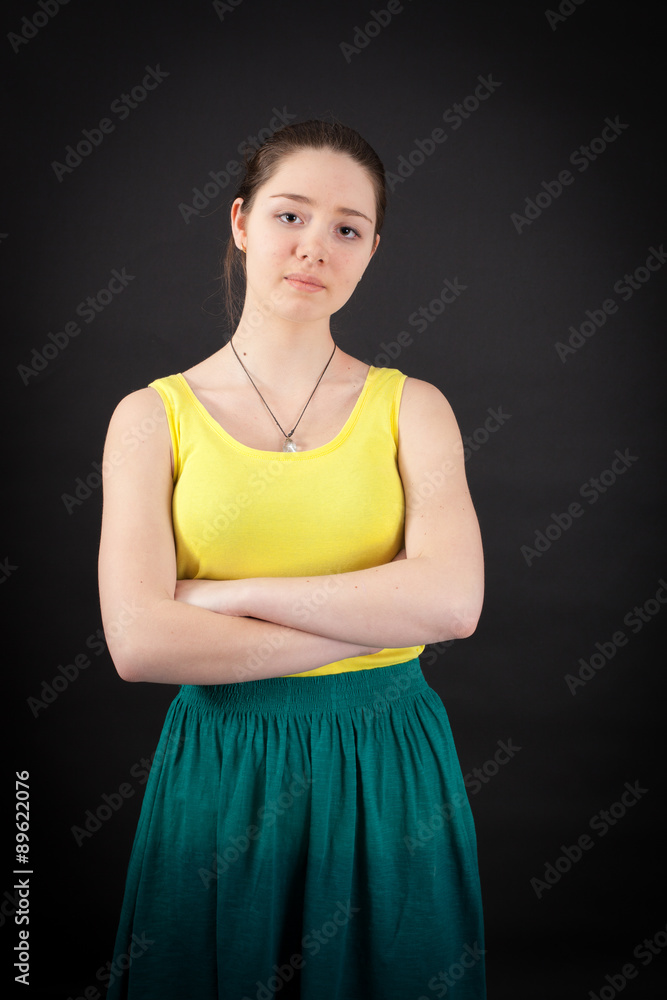 beautiful woman doing different expressions in different sets of clothes: arms crossed beautiful woman doing different expressions in different sets of clothes: arms crossed