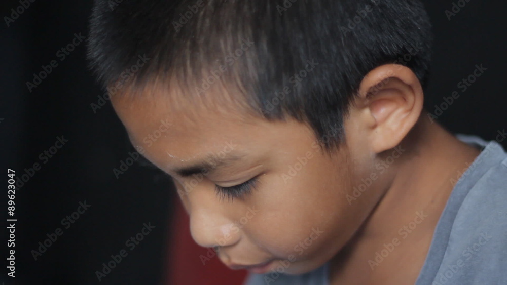 Asian boy drawing cartoon Asian boy drawing cartoon