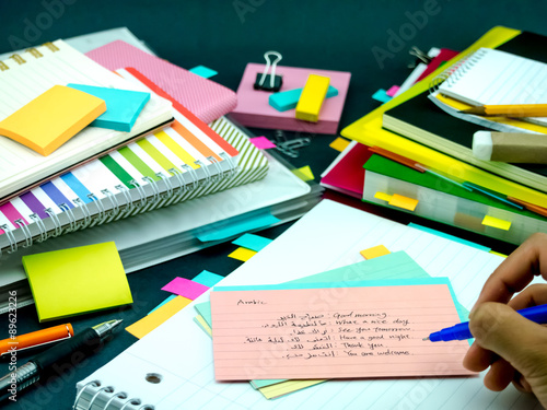 Learning New Language Writing Words Many Times on the Notebook;