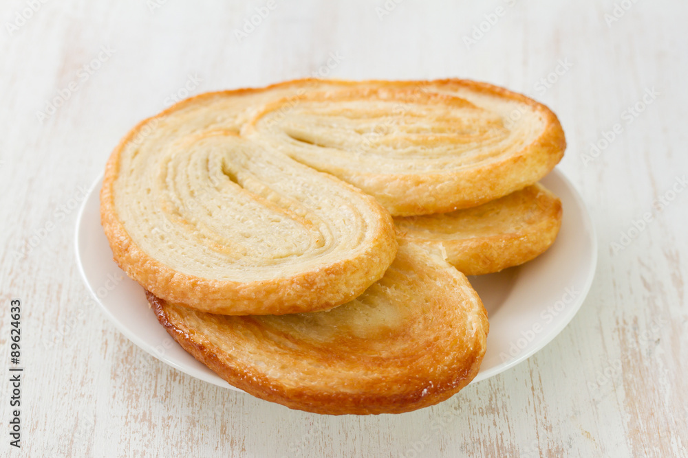 palmier on plate on white background palmier on plate on white background