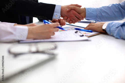 Fototapeta Naklejka Na Ścianę i Meble -  Business people shaking hands, finishing up a meeting