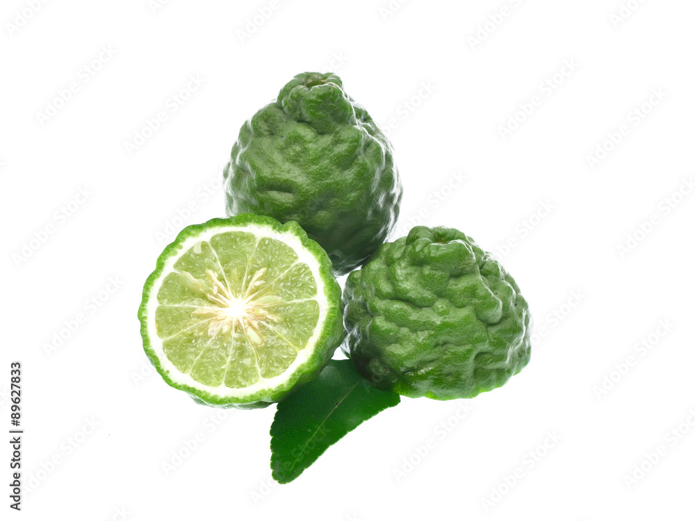 Fototapeta premium Kaffir lime with leaves isolated on white background