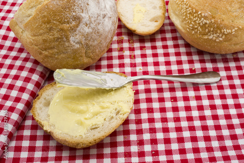Sliced of round bread with butter