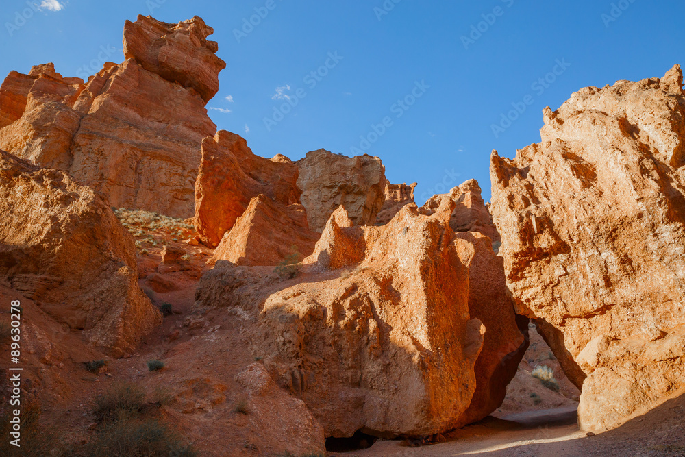 Fototapeta premium Road between two large rocks in the canyon