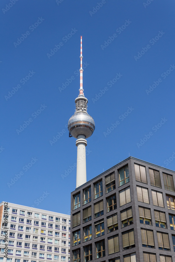 tv tower behind buildings, berlin tv tower behind buildings, berlin