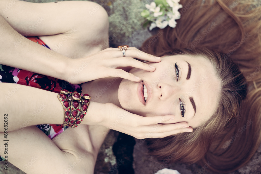 Naklejka premium closeup on beautiful blond young woman having fun sensually