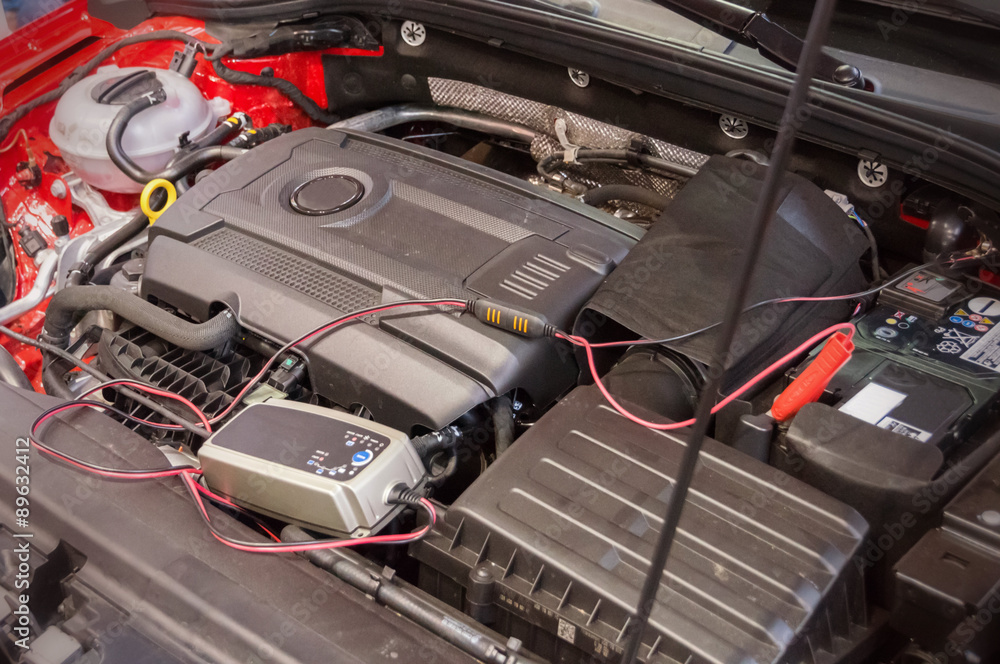 Repairing engine inside car hood