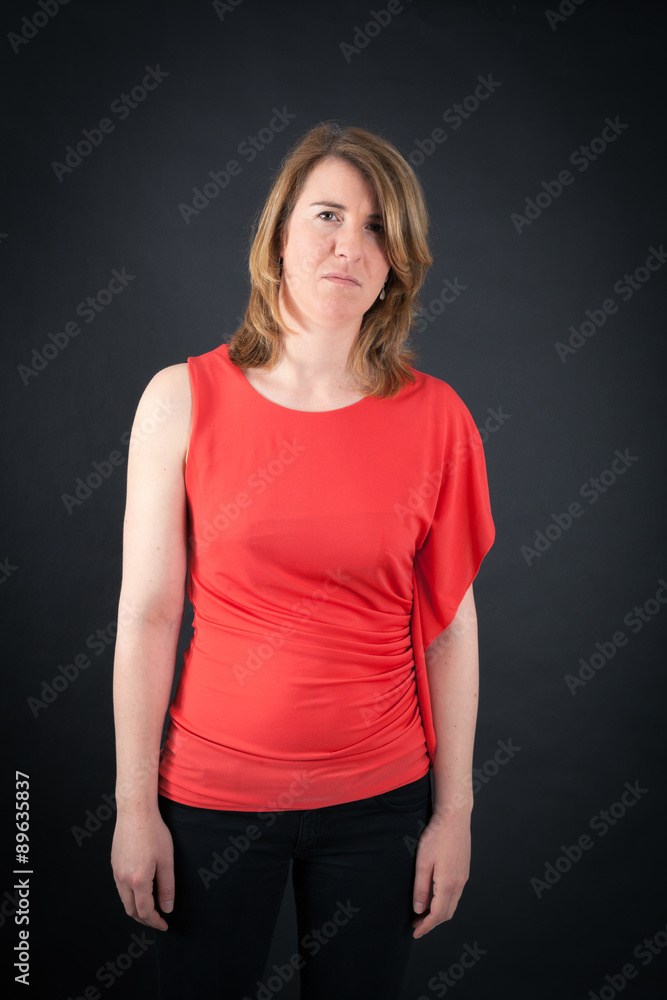 Beautiful woman doing different expressions in different sets of clothes: sad Beautiful woman doing different expressions in different sets of clothes: sad