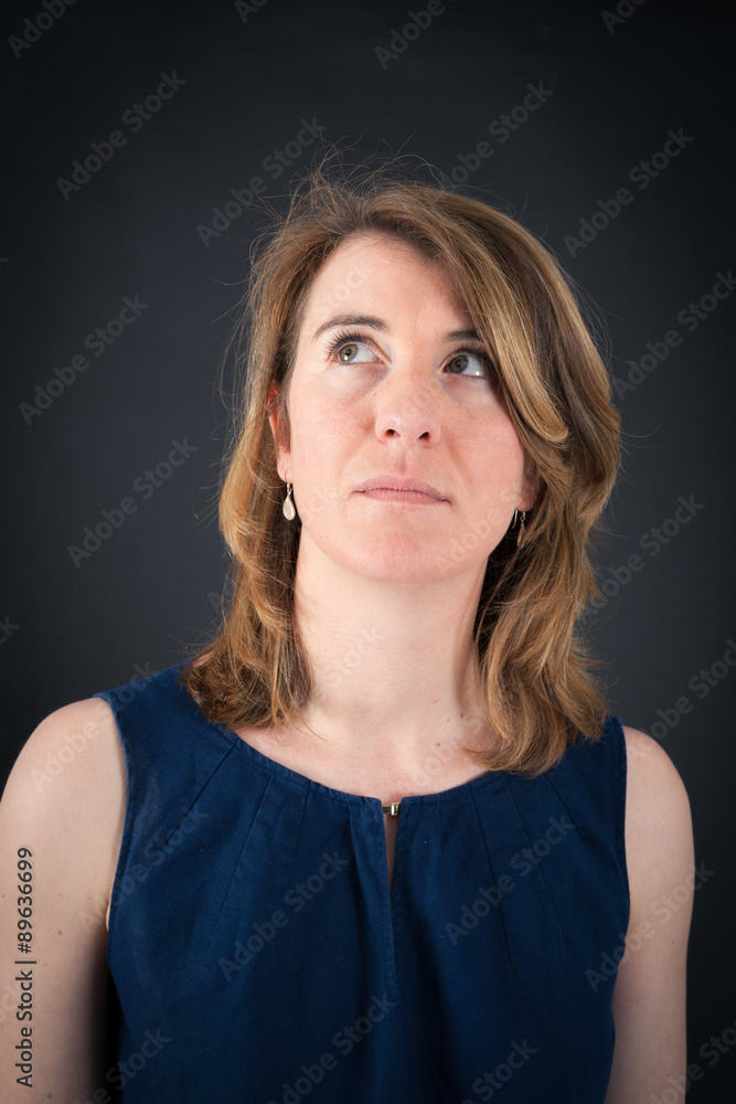 Beautiful woman doing different expressions in different sets of clothes: thinking Beautiful woman doing different expressions in different sets of clothes: thinking
