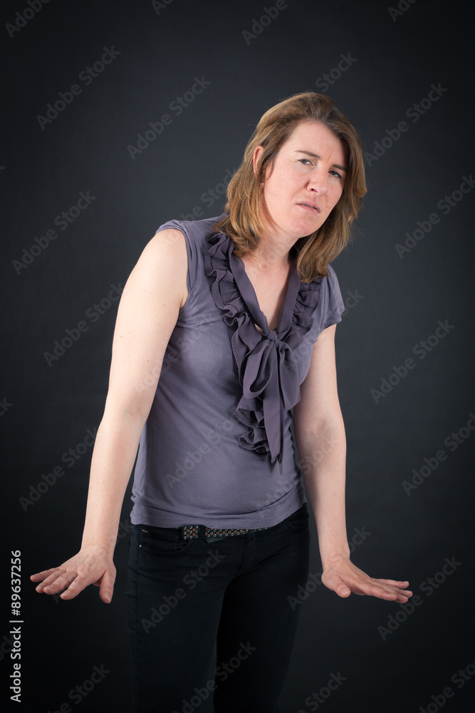 Beautiful woman doing different expressions in different sets of clothes: surprise Beautiful woman doing different expressions in different sets of clothes: surprise