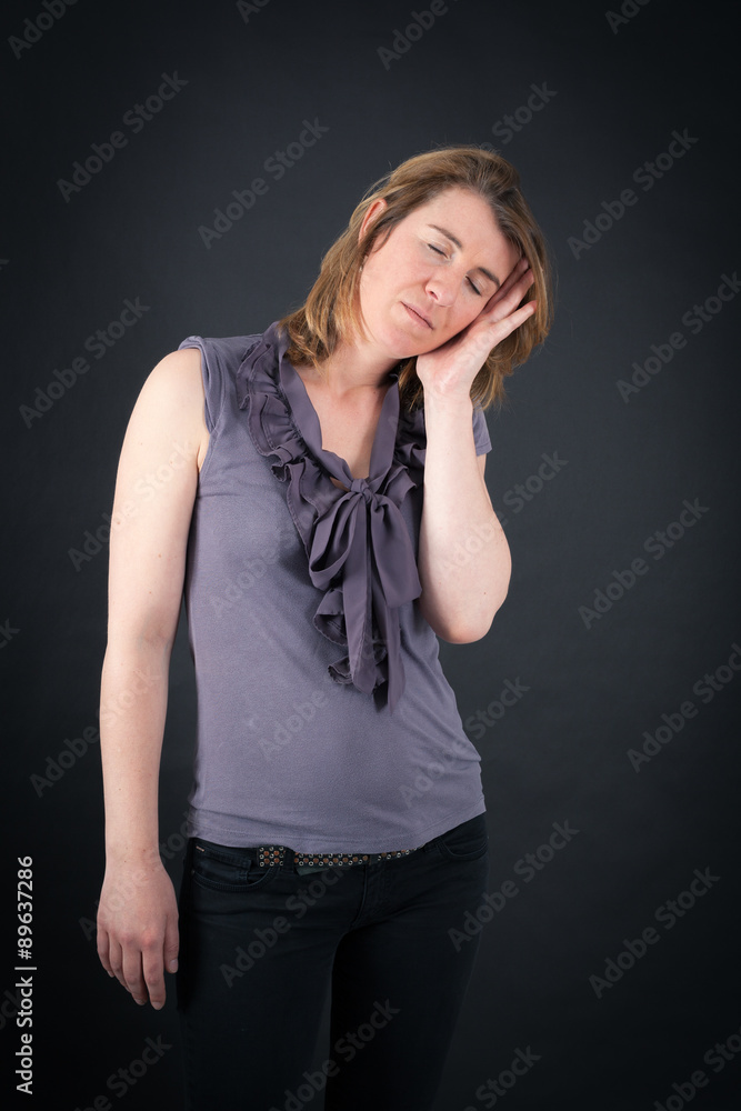 Beautiful woman doing different expressions in different sets of clothes: tired Beautiful woman doing different expressions in different sets of clothes: tired
