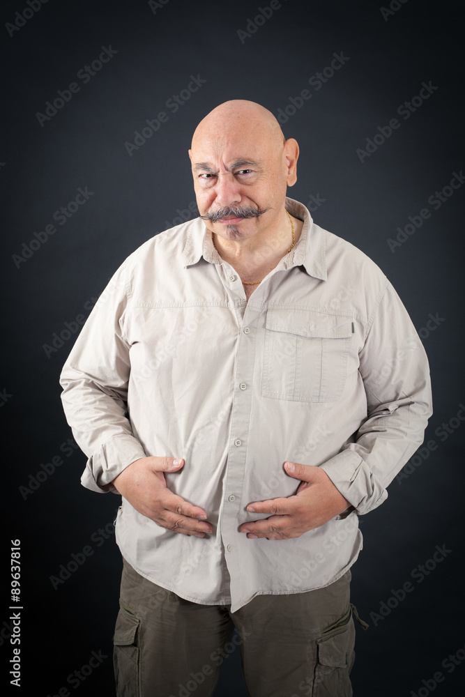 Fototapeta premium Handsome man doing different expressions in different sets of clothes: sad