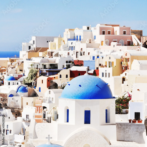 Classic Santorini scene with famous blue dome churches, Greece