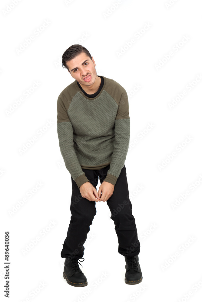 Handsome man doing different expressions in different sets of clothes: making a face Handsome man doing different expressions in different sets of clothes: making a face