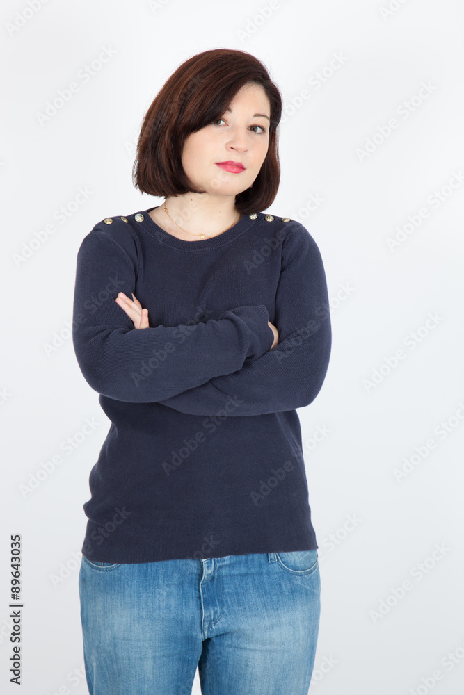 Beautiful woman doing different expressions in different sets of clothes: arms crossed Beautiful woman doing different expressions in different sets of clothes: arms crossed