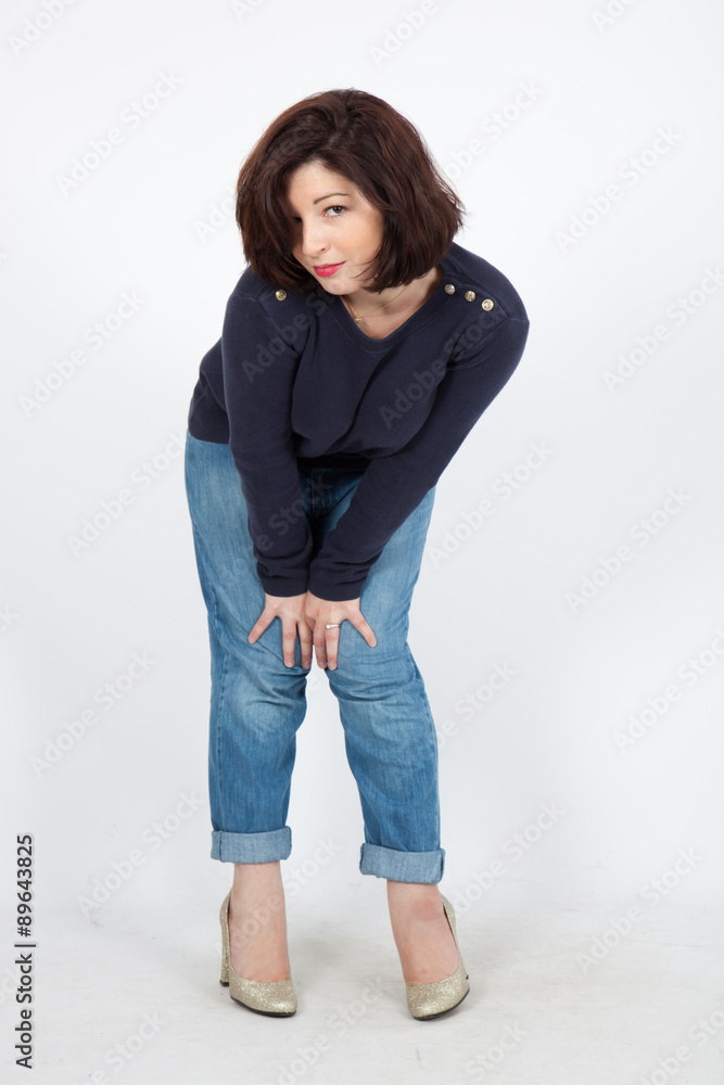 Beautiful woman doing different expressions in different sets of clothes: posing Beautiful woman doing different expressions in different sets of clothes: posing
