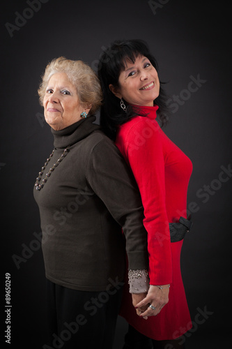 Wallpaper Mural Beautiful family doing different expressions in different sets of clothes: back to back Torontodigital.ca