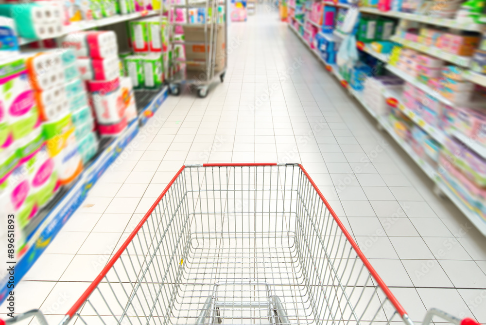 shopping cart in supermarket blurred Supermarket interior shopping cart in supermarket blurred Supermarket interior