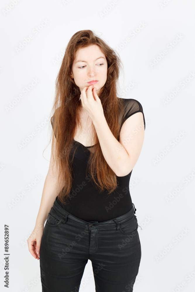 Beautiful businesswoman doing different expressions in different sets of clothes: posing Beautiful businesswoman doing different expressions in different sets of clothes: posing