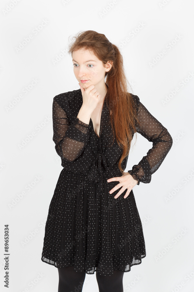 Beautiful businesswoman doing different expressions in different sets of clothes: thinking Beautiful businesswoman doing different expressions in different sets of clothes: thinking