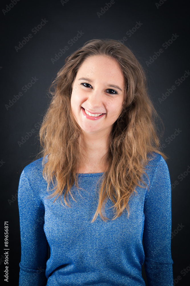 Beautiful woman doing different expressions in different sets of clothes: smile
