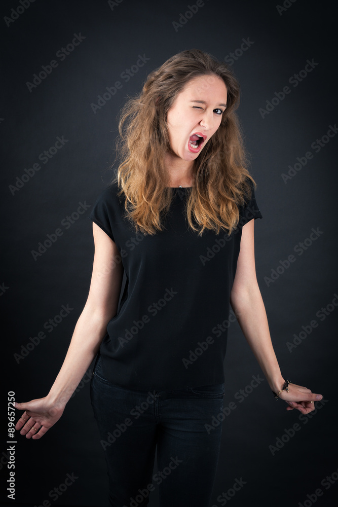 Beautiful woman doing different expressions in different sets of clothes: blinking Beautiful woman doing different expressions in different sets of clothes: blinking