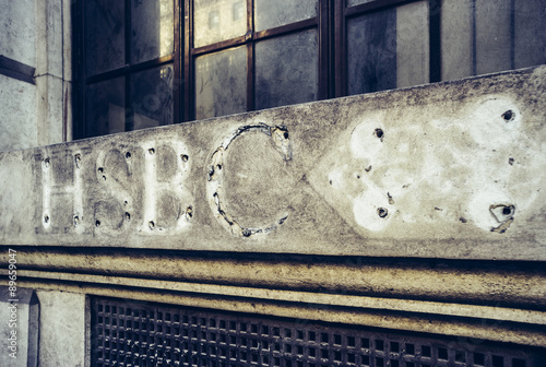 Old weathered stone where a nameplate has been removed (HSBC Bank) photo