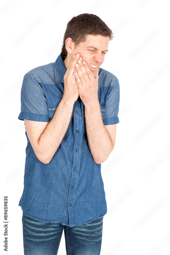 Handsome man doing different expressions in different sets of clothes: toothache Handsome man doing different expressions in different sets of clothes: toothache