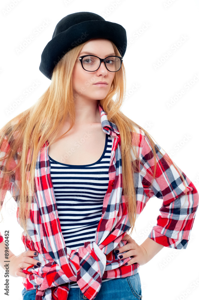 Young teenage girl in black hat, glasses and colorful clothes isolated on white background Young teenage girl in black hat, glasses and colorful clothes isolated on white background
