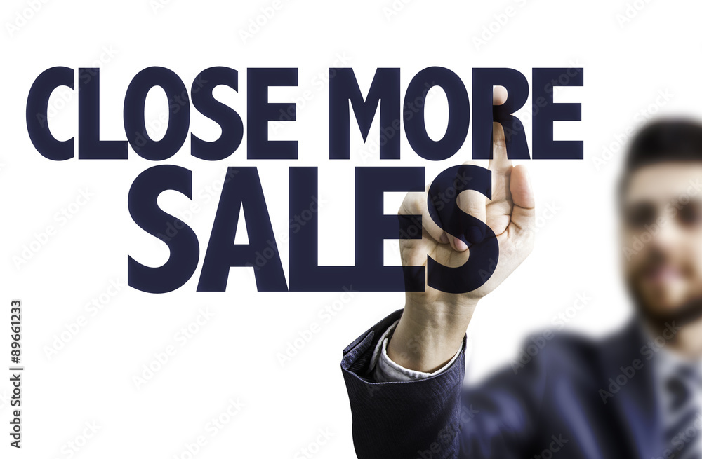 Business man pointing the text: Close More Sales Business man pointing the text: Close More Sales