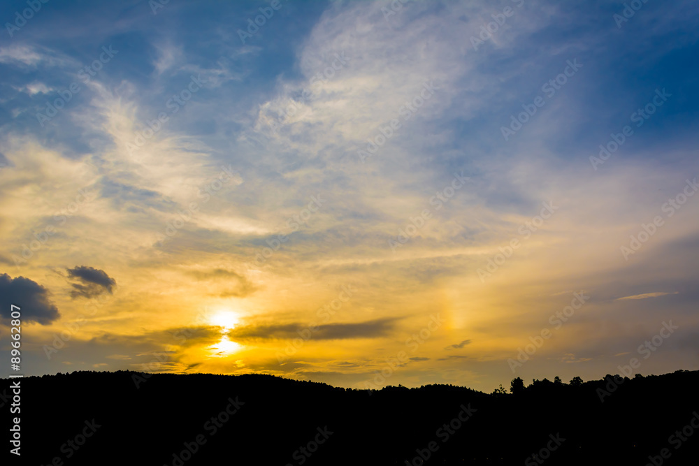 silhouette shot image of mountain and sunset sky  in background