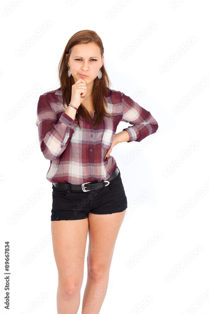 Fototapeta premium Beautiful woman doing different expressions in different sets of clothes: suspricion