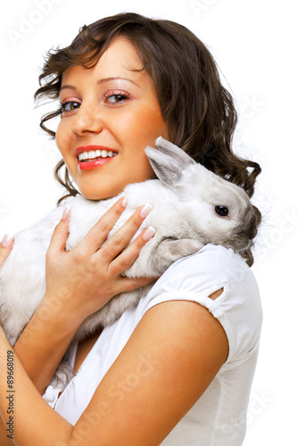 Young woman hugging rabbit © ivanmateev