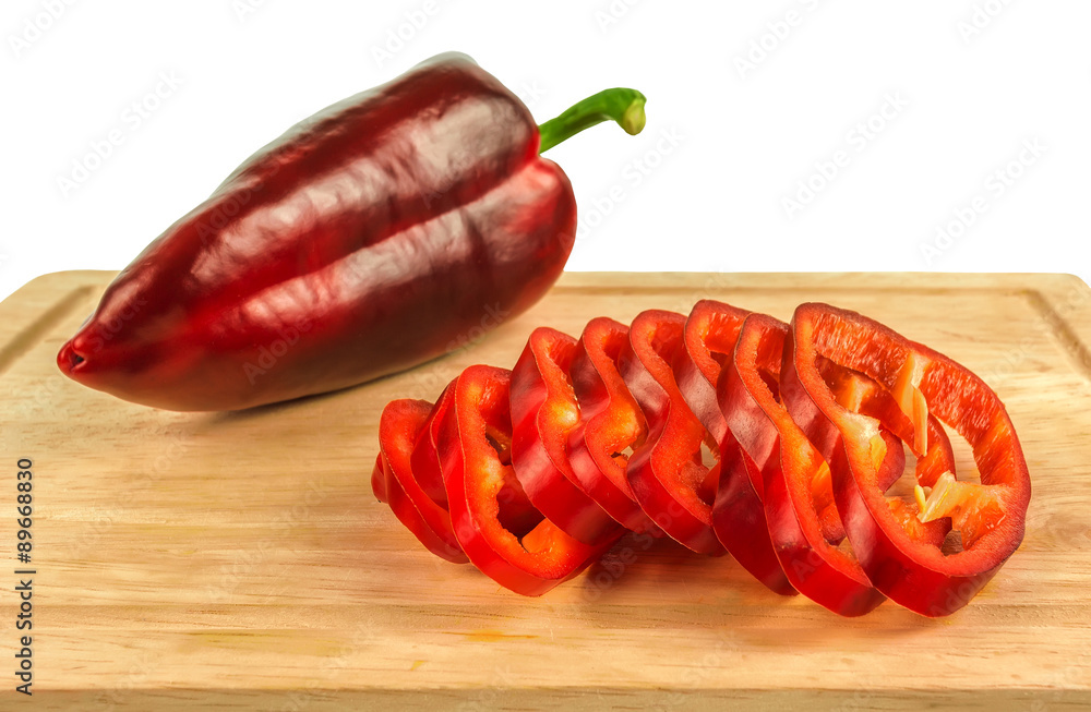 chopped rings red pepper on a board close-up chopped rings red pepper on a board close-up