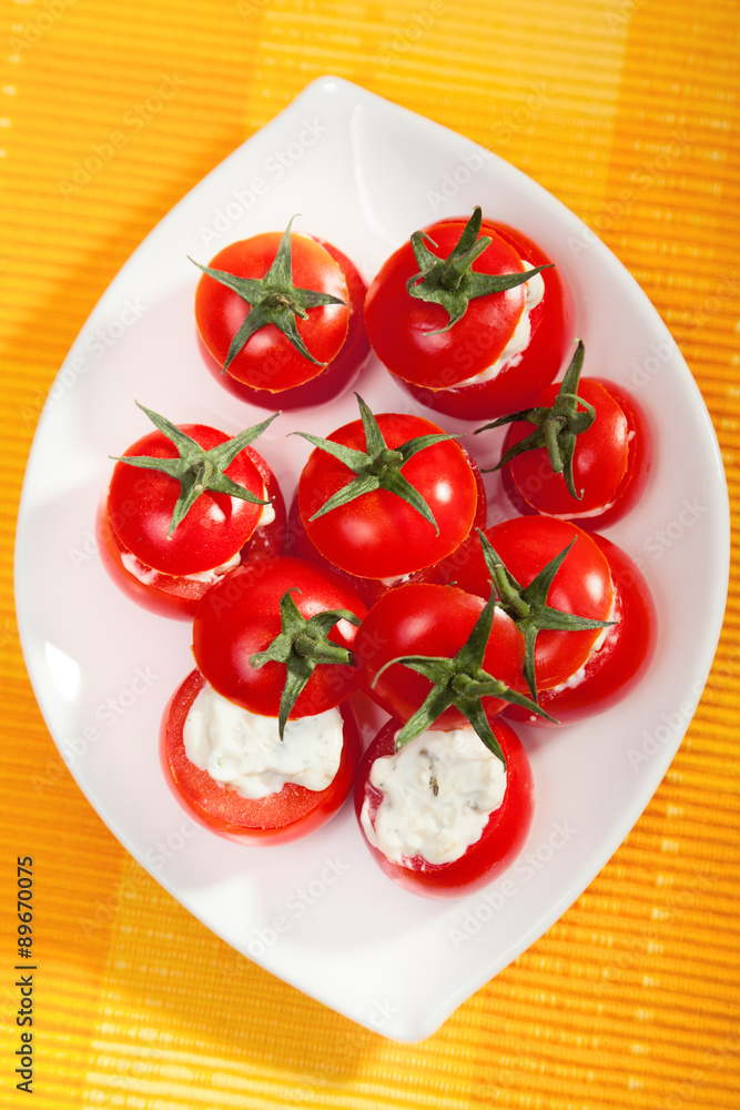 Stuffed cherry tomatoes with cheese cream Stuffed cherry tomatoes with cheese cream