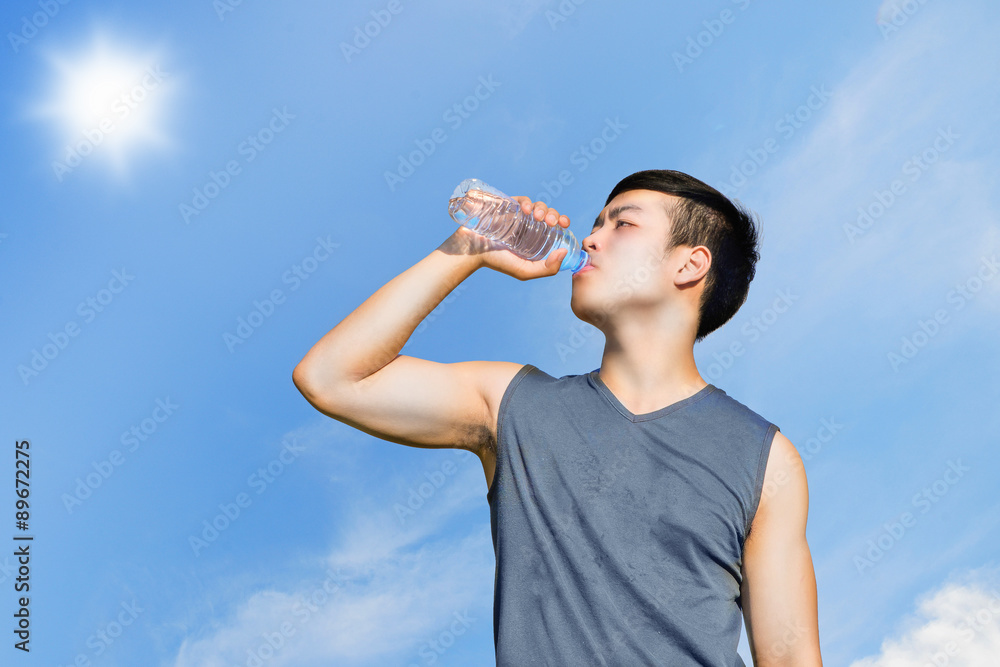 Sport and healthy concept : Thirsty athlete drinking water after Sport and healthy concept : Thirsty athlete drinking water after