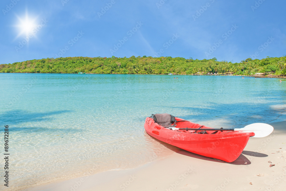 Summer, Travel, Vacation and Holiday concept - Red kayaks on the Summer, Travel, Vacation and Holiday concept - Red kayaks on the