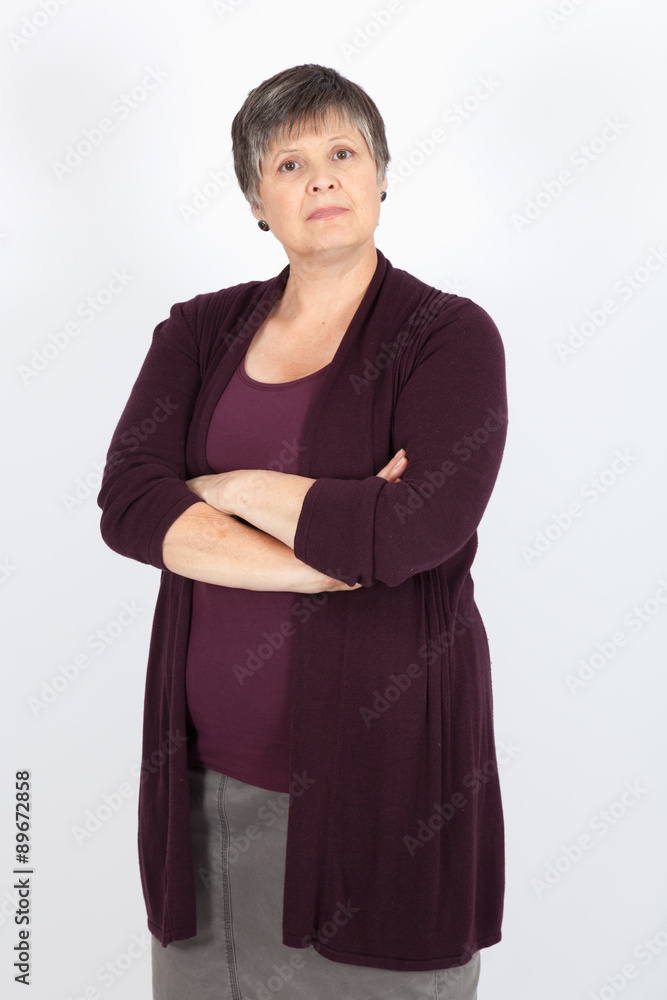 Beautiful woman doing different expressions in different sets of clothes: arms crossed Beautiful woman doing different expressions in different sets of clothes: arms crossed