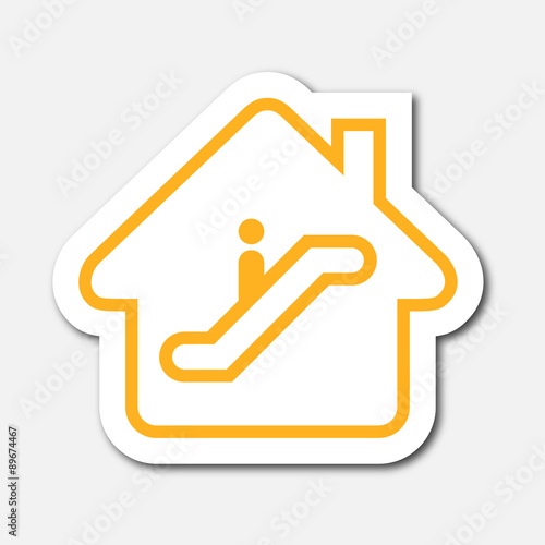 Logo maison et escalator.