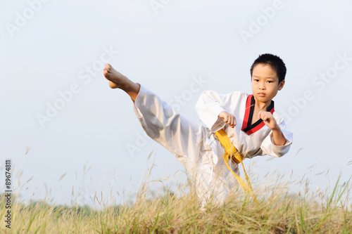 Asian boy practice taekwondo