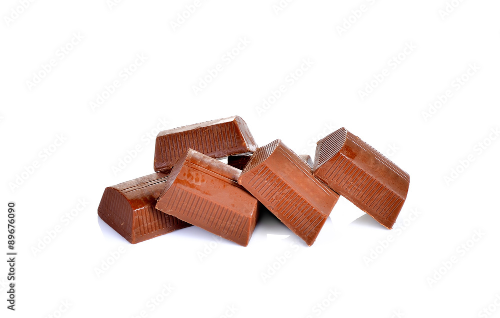 chocolate pieces on white background chocolate pieces on white background