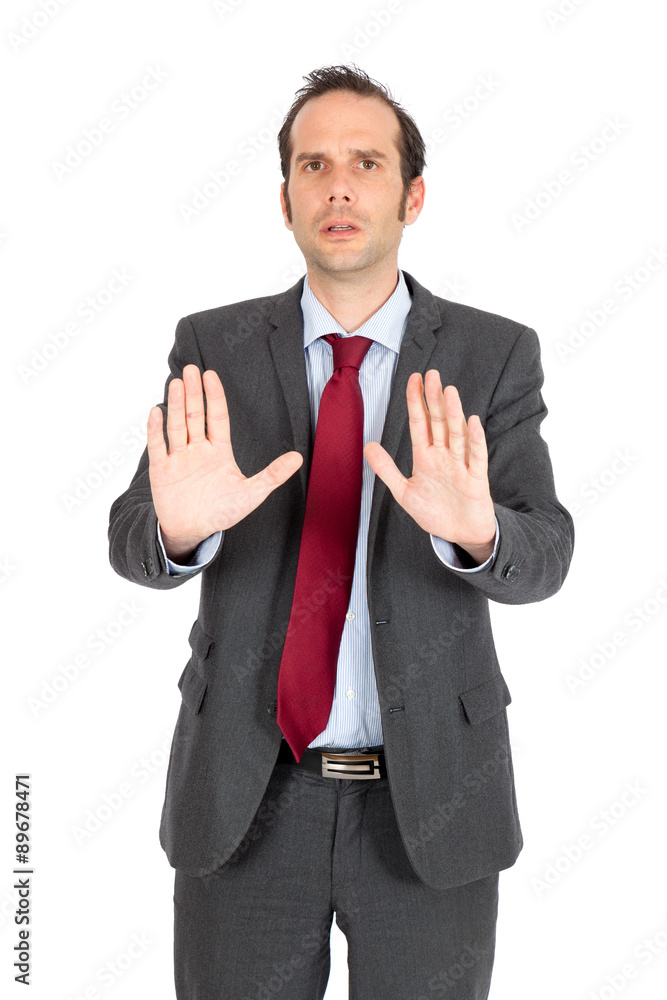 Handsome businessman doing different expressions in different sets of clothes: stop sign Handsome businessman doing different expressions in different sets of clothes: stop sign