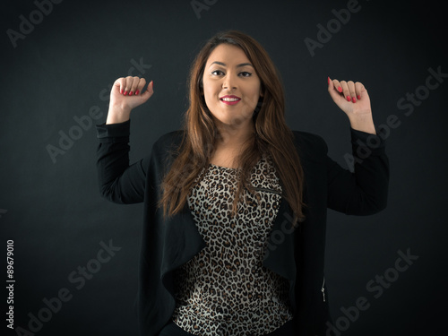Wallpaper Mural Beautiful woman doing different expressions in different sets of clothes: arms raised Torontodigital.ca