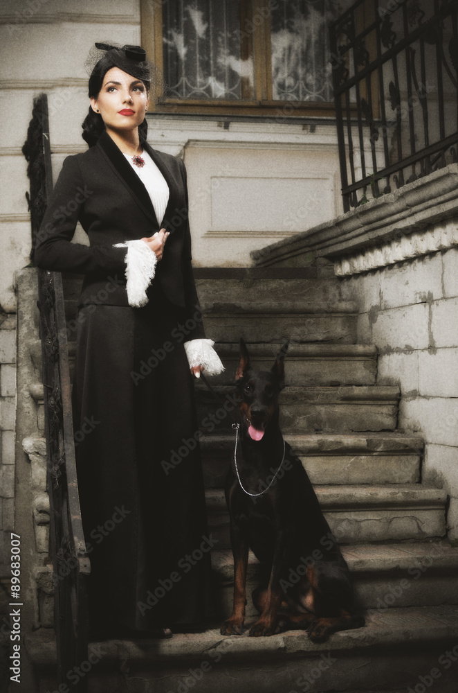 Naklejka premium Young woman in ancient costume with dog (ancient ver)
