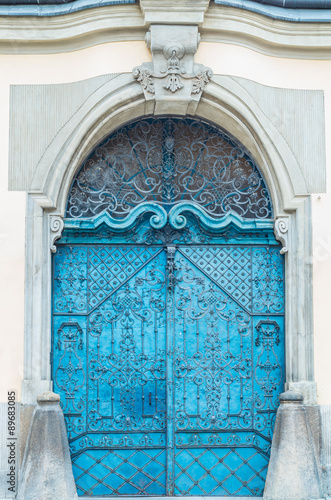 Blue painted richly decorated baroque steel door