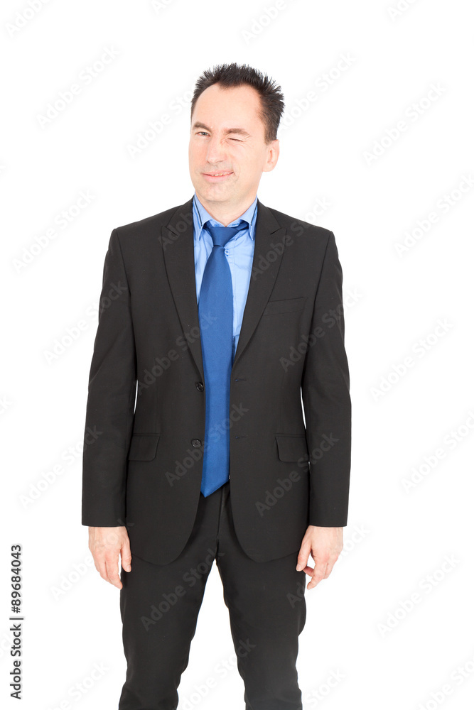 Handsome businessman doing different expressions in different sets of clothes: blinking Handsome businessman doing different expressions in different sets of clothes: blinking