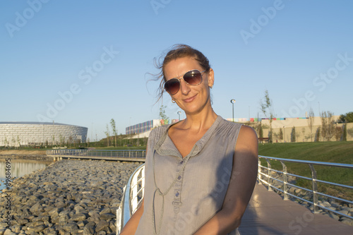 middle-aged woman in sunglasses