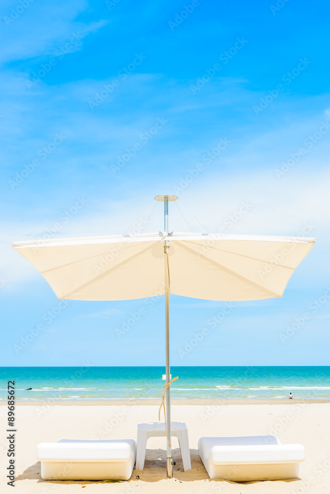 Umbrella and chair on the beach