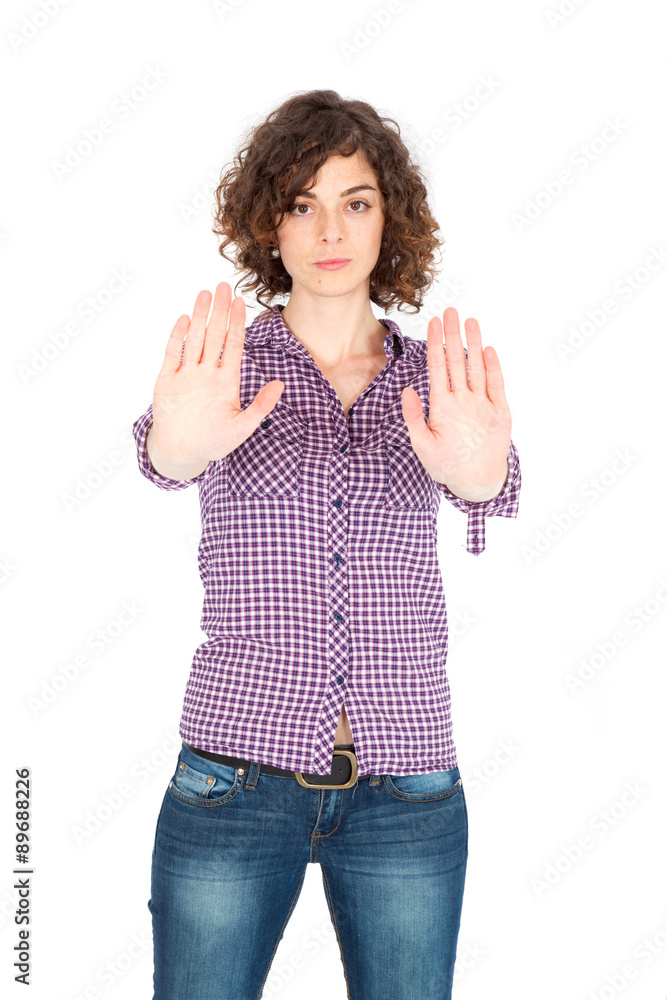 Beautiful Hispanic woman doing different expressions in different sets of clothes: stop sign Beautiful Hispanic woman doing different expressions in different sets of clothes: stop sign