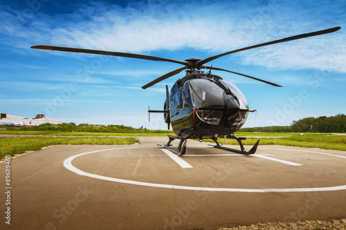 Canvas Print The helicopter in airfield